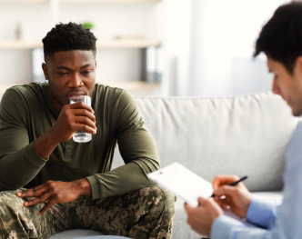 male soldier talk to psychiatrist